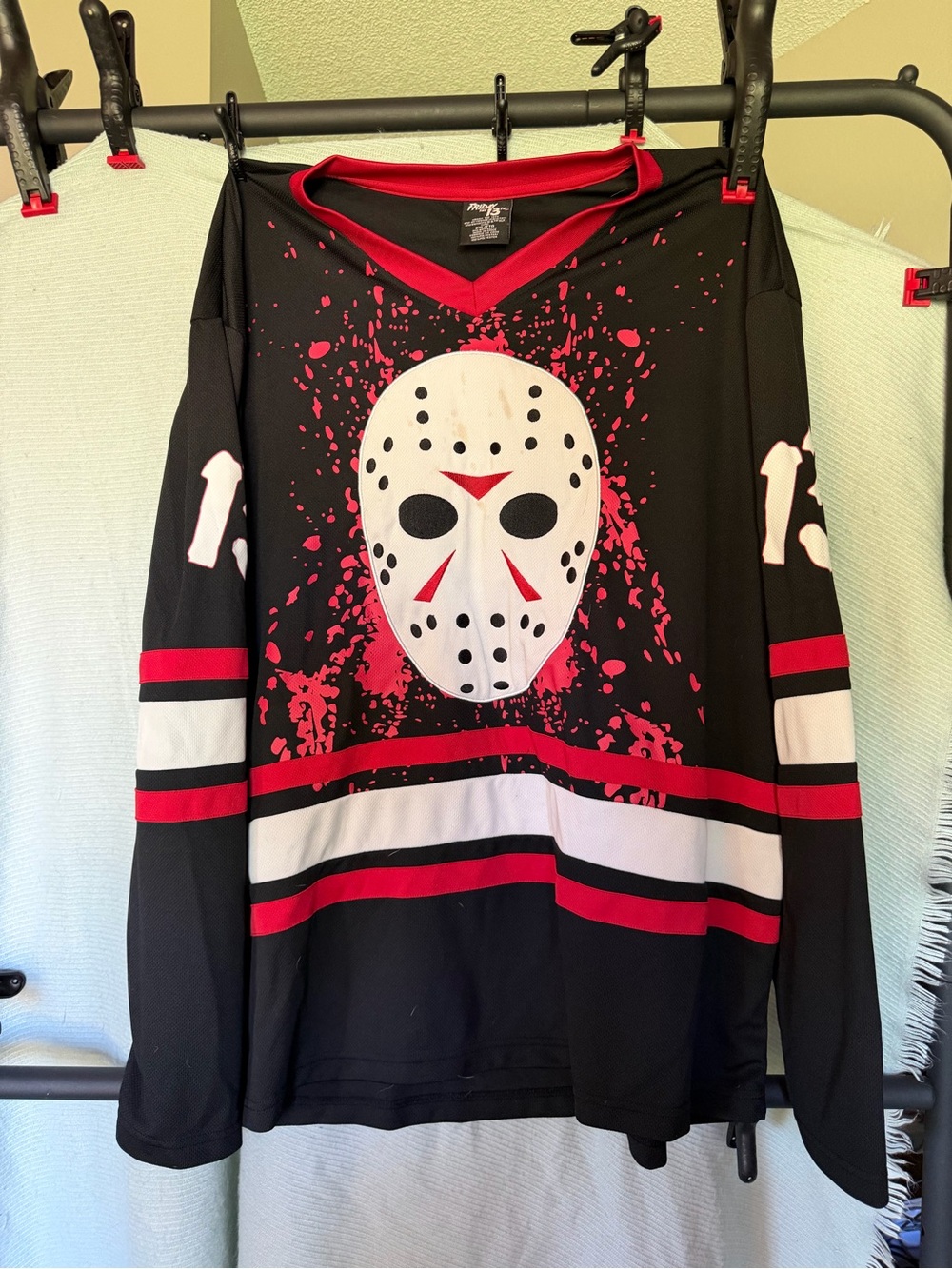 Black & Red Hockey-Style Pullover Jersey with Mask Graphic